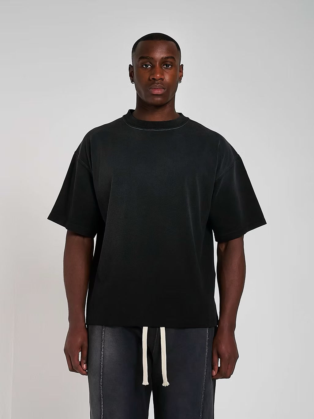Model view of Kaizen Market Blank Heavyweight Fade Out Black T-shirt